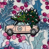 Festive magnetic needle minder