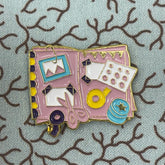 Crafting book needle minder