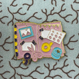 Crafting book needle minder