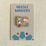 Crafting book needle minder
