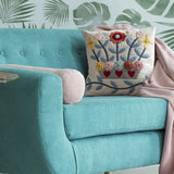 Basket of Blooms cushion on a sofa